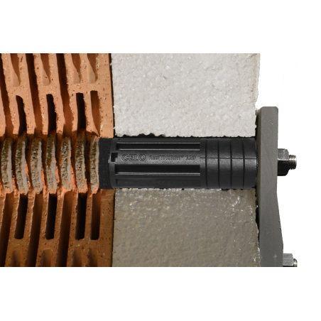 Imagen de aplicación del sistema de montaje a distancia ResiTHERM: corte de fachada que muestra el producto, el aislamiento y el ladrillo perforado desde el lateral