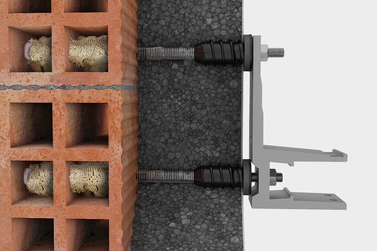 Soporte fijado sobre una fachada de SATE con un taco ResiTHERM 12 de CELO